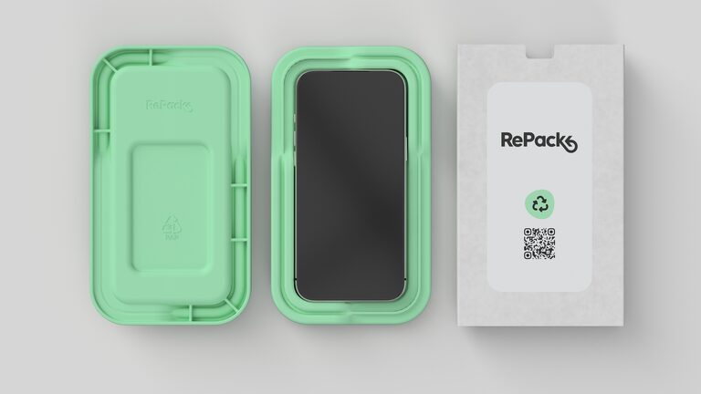 Vie (Sales Pack) components: a moulded paper-pulp tray, a tray holding a smartphone, and a branded outer sleeve with a QR code